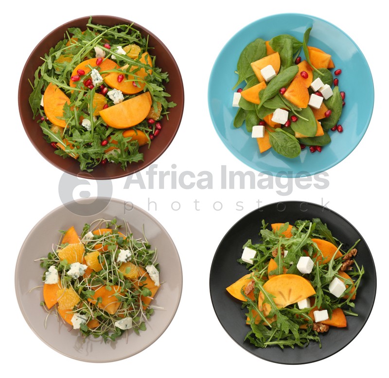 Set with tasty persimmon salads on white background, top view