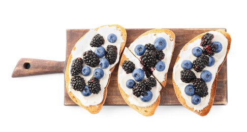 Tasty sandwiches with cream cheese, blueberries and blackberries isolated on white, top view