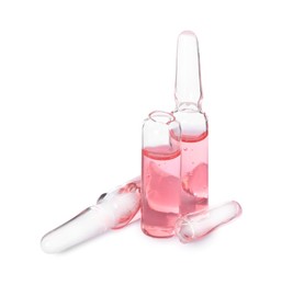 Open and closed glass ampoules with pharmaceutical product on white background