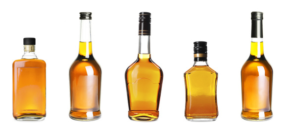Collage with bottles of whiskey on white background. Banner design