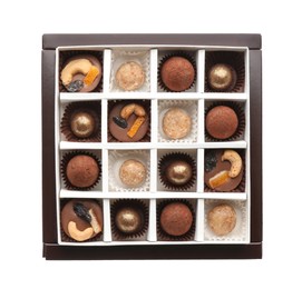 Delicious chocolate candies in box on white background, top view