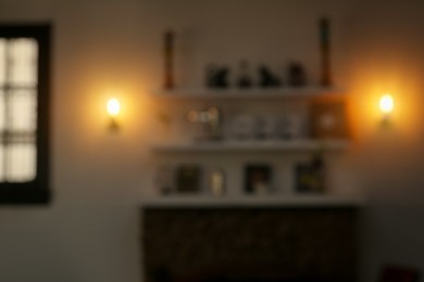 Photo of Blurred view of beautiful cozy cafe interior