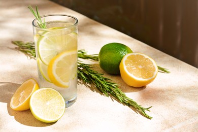 Photo of Summer refreshing lemonade and ingredients on light table