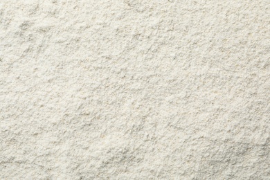 Oat flour as background, top view. Gluten free product