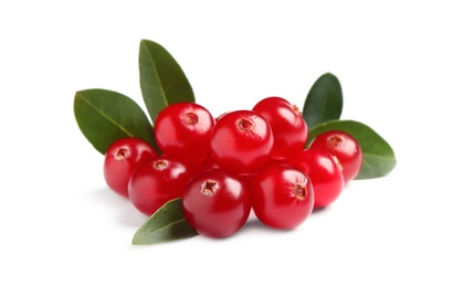 Pile of fresh cranberries with green leaves on white background