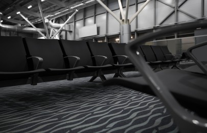 Waiting area with seats in airport terminal