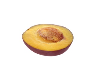 Half of ripe plum isolated on white