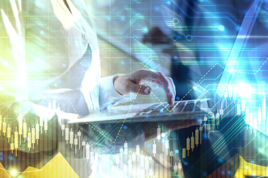 Image of Double exposure of businesswoman with modern laptop and circuit board illustration, closeup