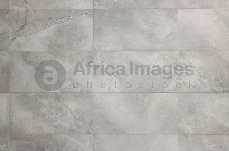 Beautiful grey marble surface of wall as background, closeup