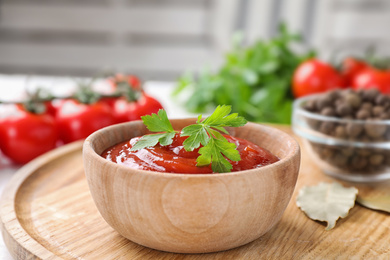 Delicious fresh tomato sauce on table, closeup