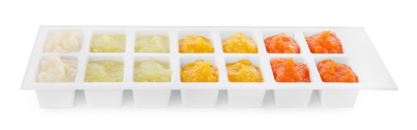 Different purees in ice cube tray on white background. Ready for freezing