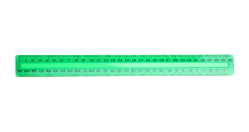 Colorful plastic ruler isolated on white, top view. School stationery