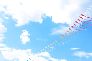 Beautiful kites drifting in blue sky