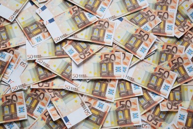 50 Euro banknotes as background, top view. Money exchange