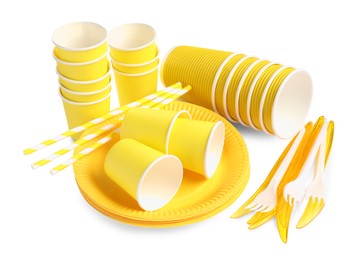 Set of bright disposable tableware on white background