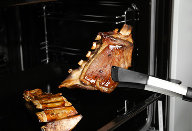 Delicious roasted ribs in oven. Yummy meat