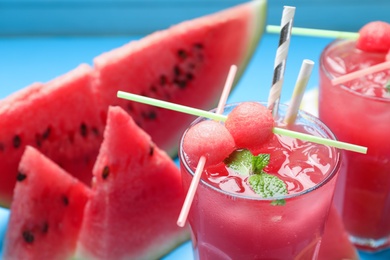 Tasty watermelon drink with fresh fruit and mint, closeup