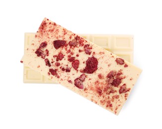 Photo of Chocolate bars with freeze dried raspberries on white background, top view