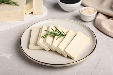 Delicious tofu with rosemary served on light table