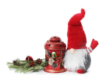 Funny Christmas gnome and festive decor on white background