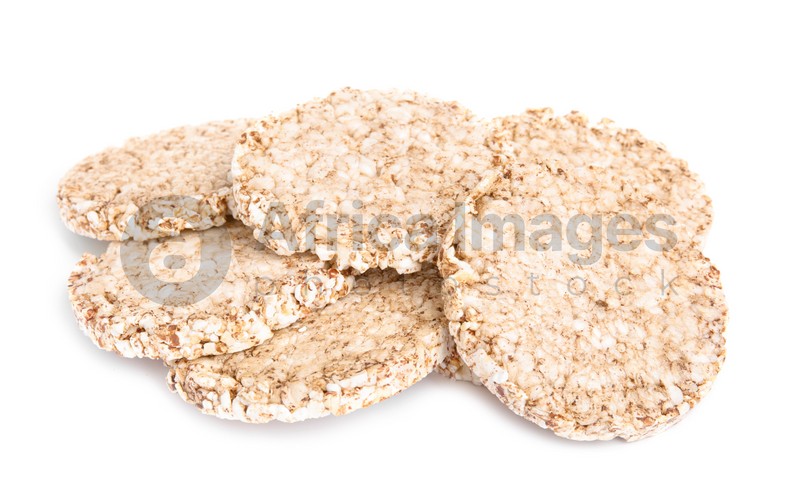 Many crunchy buckwheat cakes on white background