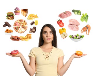 Doubtful woman choosing between between healthy and unhealthy food on white background