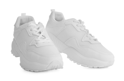 Stylish sneakers on white background. Trendy footwear