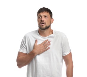 Man suffering from pain during breathing on white background