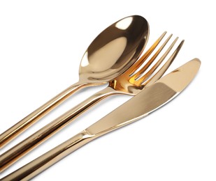 New shiny golden cutlery on white background