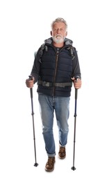 Male hiker with backpack and trekking poles on white background