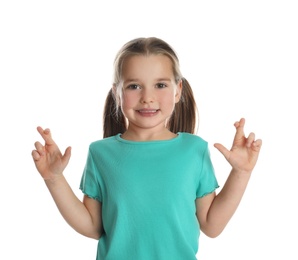 Child with crossed fingers on white background. Superstition concept
