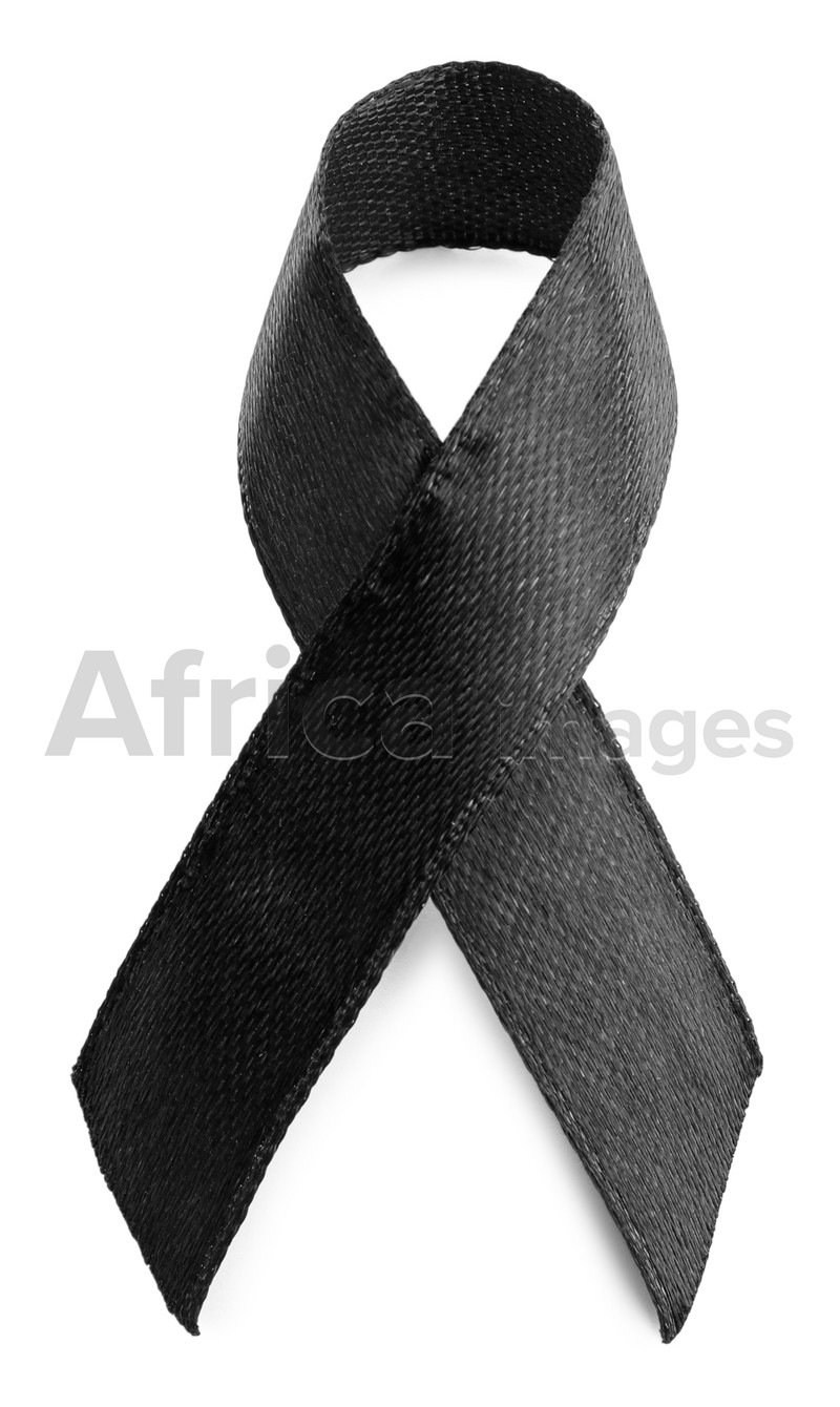 Photo of Black ribbon isolated on white, top view. World Cancer Day