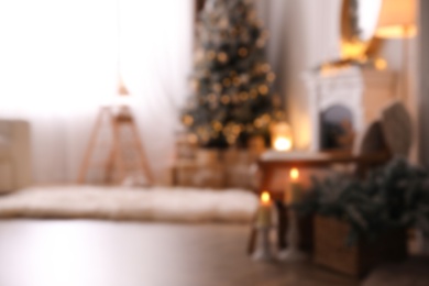 Blurred view of beautiful room interior with Christmas tree