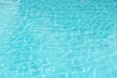 Clear refreshing water in swimming pool, closeup