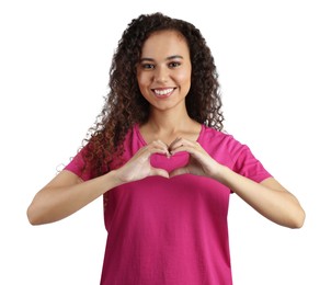Happy young African-American woman making heart with hands on white background