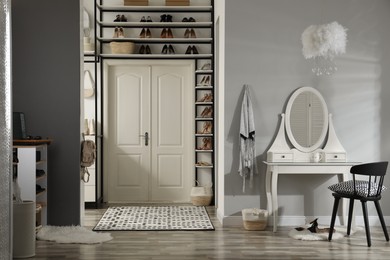 Dressing room interior with storage rack for shoes and accessories