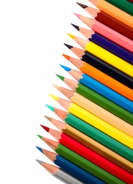 Different color pencils on white background, top view. School stationery
