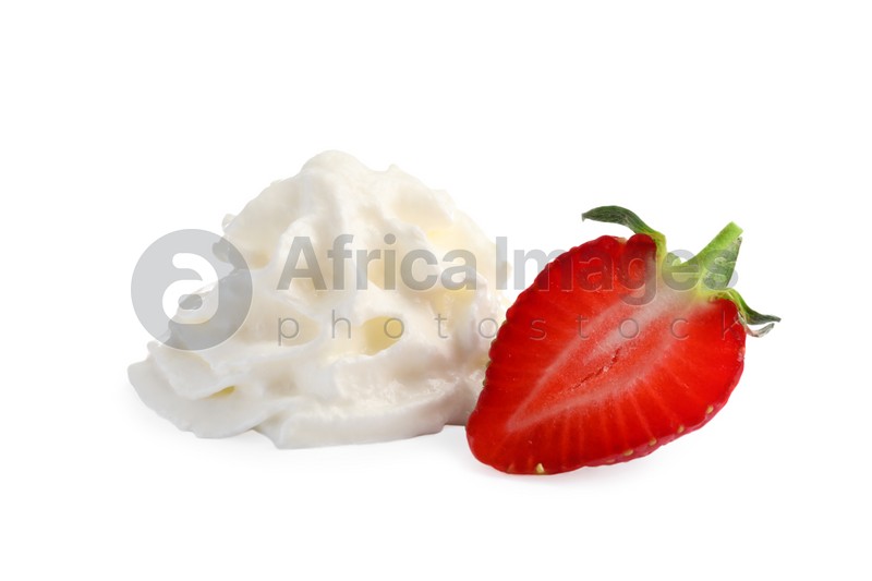 Sliced strawberry with whipped cream on white background