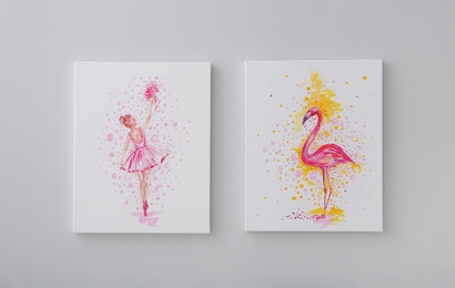 Beautiful pictures of flamingo and ballerina on grey wall. Decoration for interior design