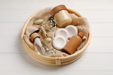 Photo of Spa gift set with personal products on white wooden table