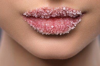 Photo of Woman with beautiful plump lips covered in sugar, closeup