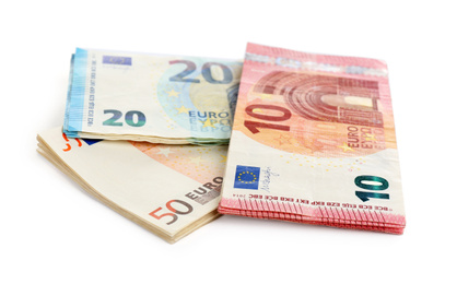 Euro banknotes on white background. Money and finance
