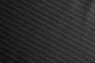 Texture of dark striped fabric as background, closeup