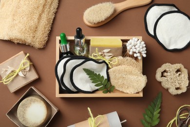 Flat lay composition with eco friendly products on brown background