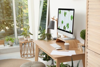 Stylish room interior with comfortable workplace. Home office