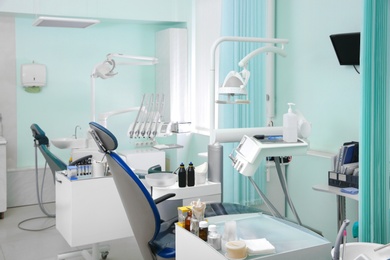 Dentist's office with modern chairs and professional equipment