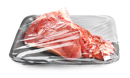 Fresh raw beef cut in plastic container isolated on white