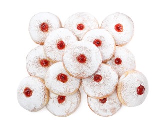Delicious donuts with jelly and powdered sugar on white background, top view