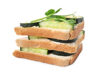 Tasty cucumber sandwiches with sesame seeds and pea microgreens isolated on white