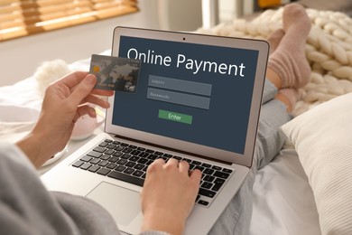 Image of Woman using laptop for online payment indoors, closeup